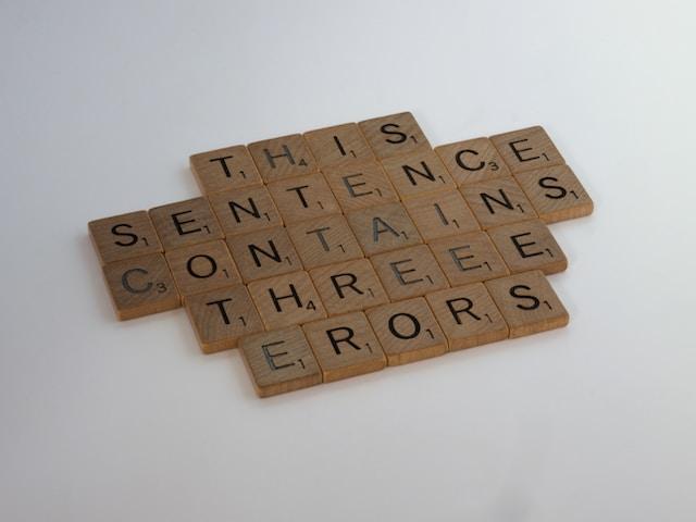 Scrabble stones "This sentence contains three errors"