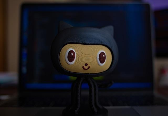 Github octo in front of computer